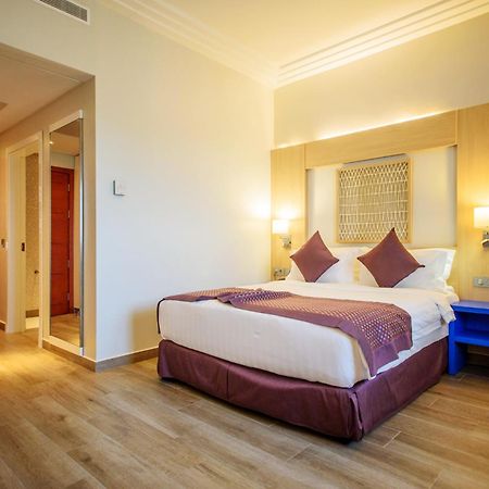 Golden Tulip Le Diplomate Hotel โกโตนู ภายนอก รูปภาพ