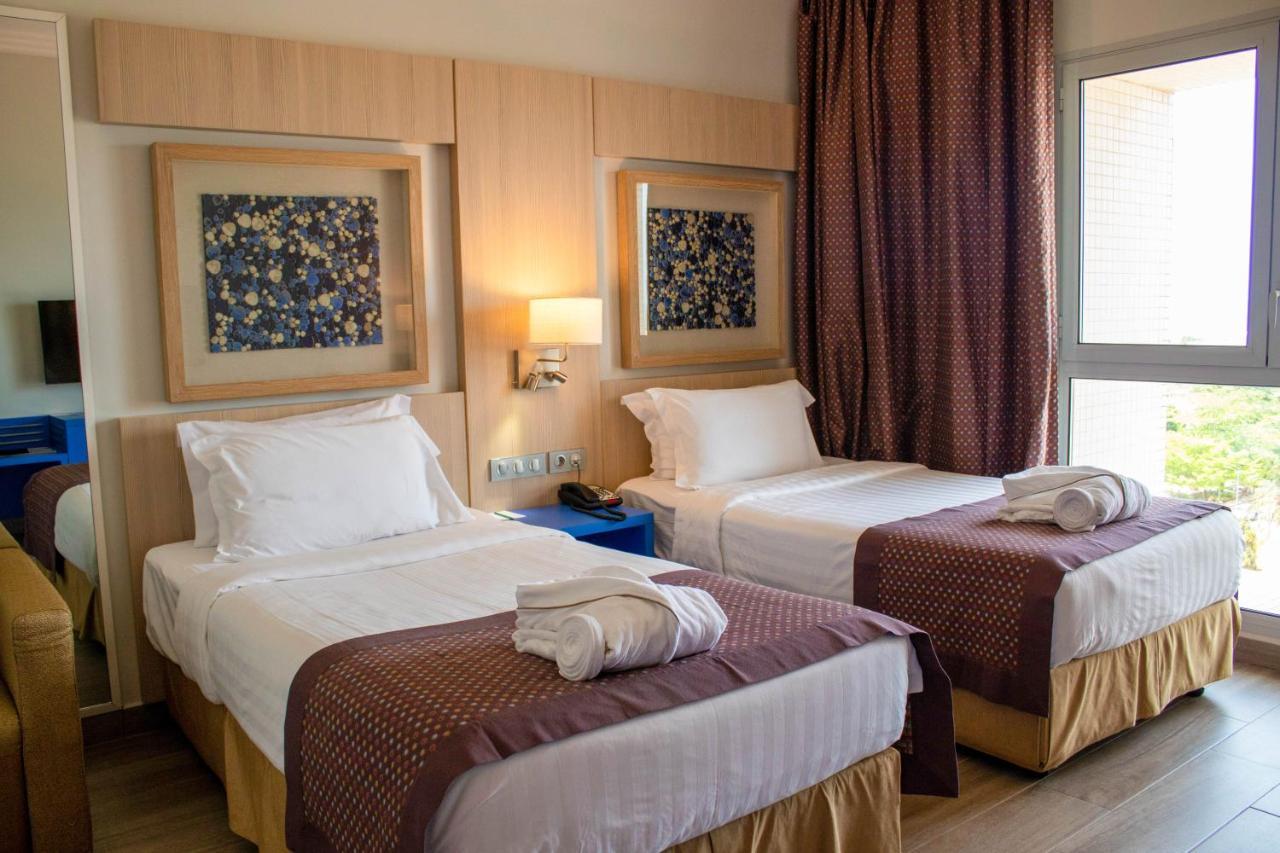 Golden Tulip Le Diplomate Hotel โกโตนู ภายนอก รูปภาพ