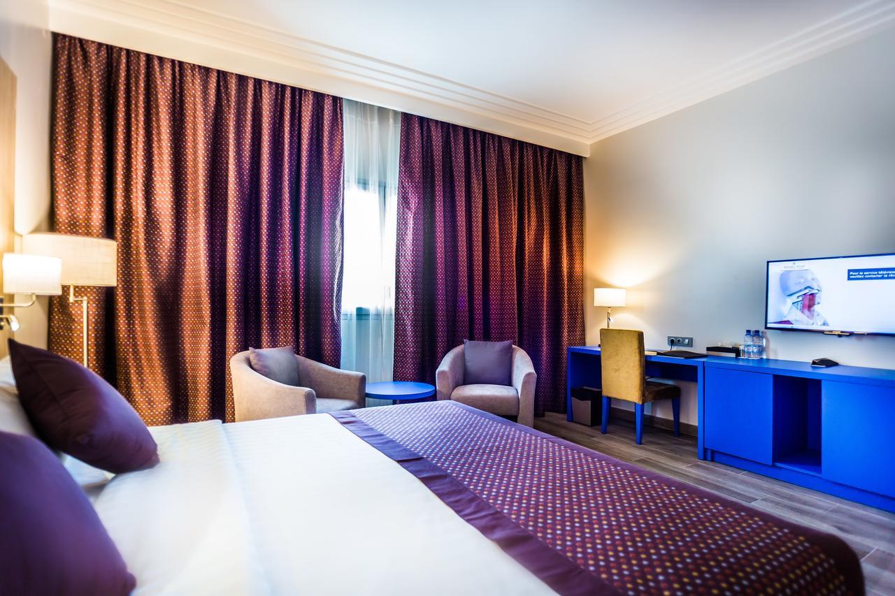 Golden Tulip Le Diplomate Hotel โกโตนู ภายนอก รูปภาพ