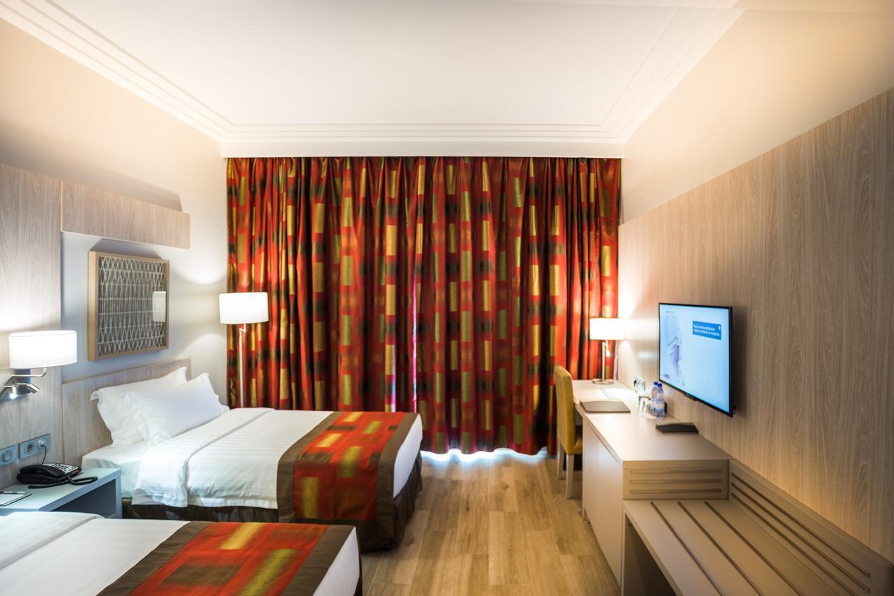 Golden Tulip Le Diplomate Hotel โกโตนู ภายนอก รูปภาพ